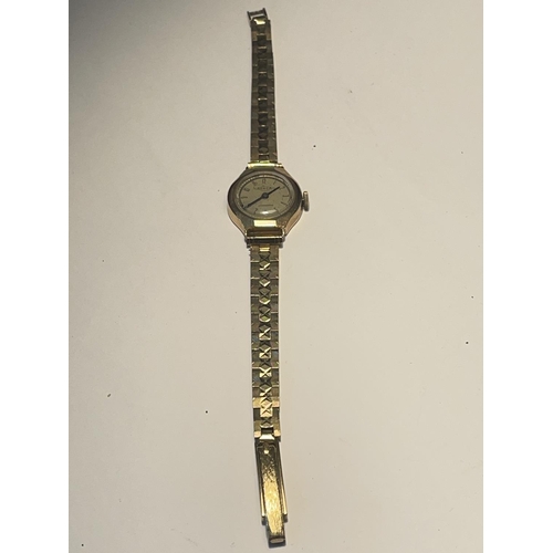 656 - A 9 CARAT GOLD ADECA AUTOMATIC WRIST WATCH WITH GOLD PLATED STRAP