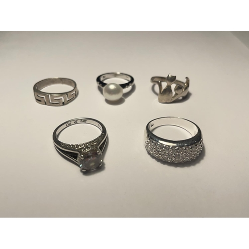 673 - FIVE VARIOUS SILVER RINGS