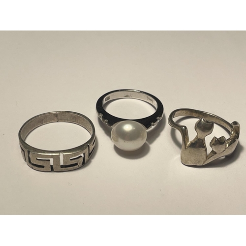 673 - FIVE VARIOUS SILVER RINGS