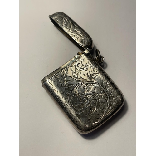 676 - A HALLMARKED BIRMINGHAM SILVER VESTA CASE