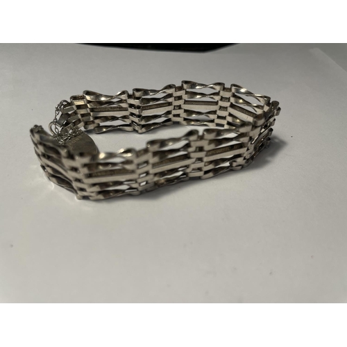 679 - TWO FIVE BAR SILVER GATE BRACELETS