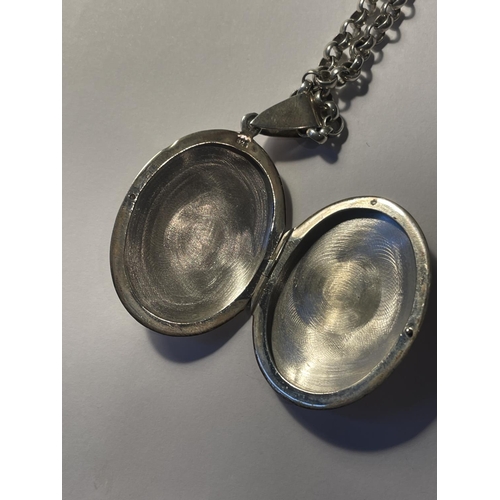 680 - A LARGE SILVER LOCKET ON A BELCHER CHAIN