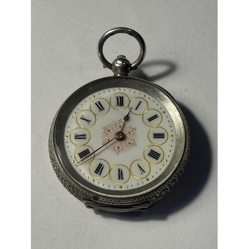 685 - A MARKED 935 SILVER FOB WATCH WITH A WHITE ENAMEL DECORATIVE FACE AND ROMAN NUMERALS