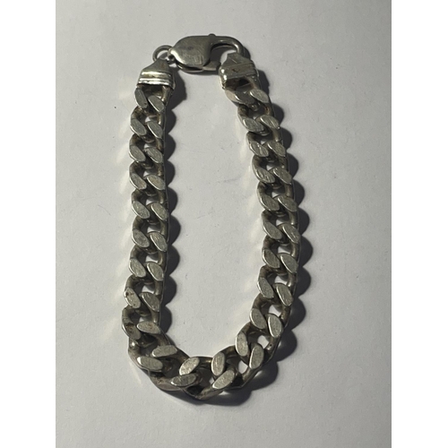 688 - A HEAVY SILVER FLAT LINK BRACELET