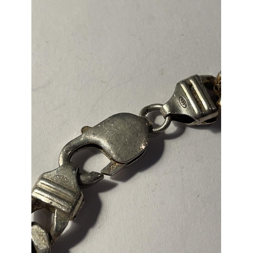 688 - A HEAVY SILVER FLAT LINK BRACELET