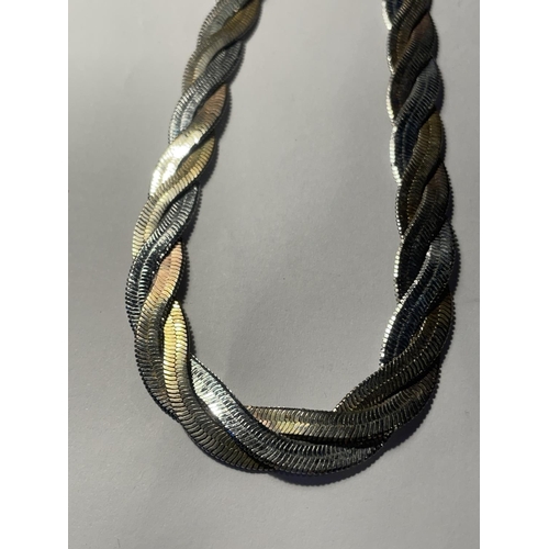 689 - TWO SILVER TWIST FLAT LINK NECKLACES ONE WITH SILVER GILT