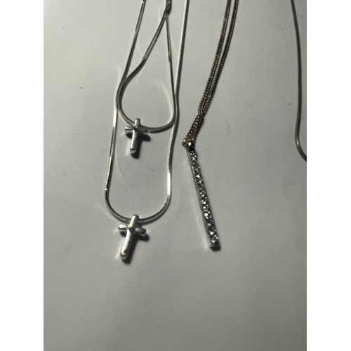 692 - FOUR SILVER NECKLACES WITH PENDANTS