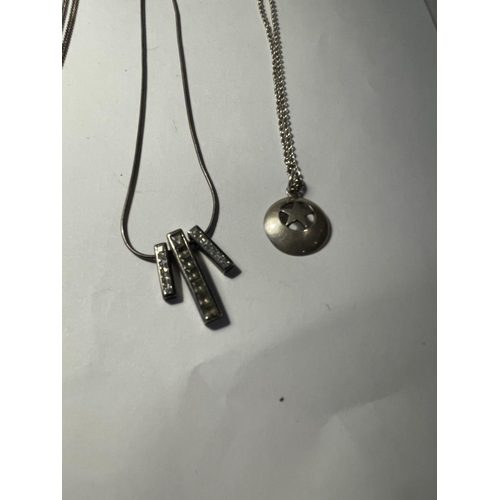 692 - FOUR SILVER NECKLACES WITH PENDANTS