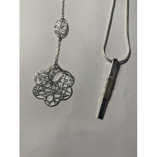 698 - FOUR SILVER NECKLACES WITH PENDANTS