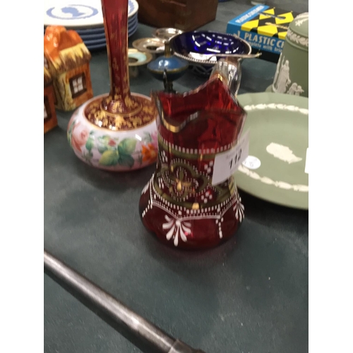 112 - A VICTORIAN HAND PAINTED CRANBERRY GLASS JUG