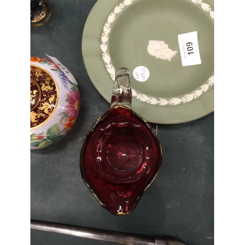 112 - A VICTORIAN HAND PAINTED CRANBERRY GLASS JUG