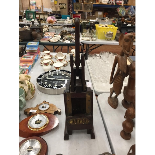 234A - A VINTAGE WOOD AND BRASS PRESS