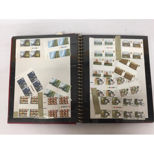 377 - A STAMP ALBUM CONTAINING A LARGE QUANTITY OF BRITISH MINT STAMPS