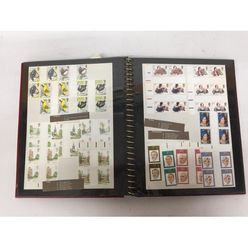 377 - A STAMP ALBUM CONTAINING A LARGE QUANTITY OF BRITISH MINT STAMPS