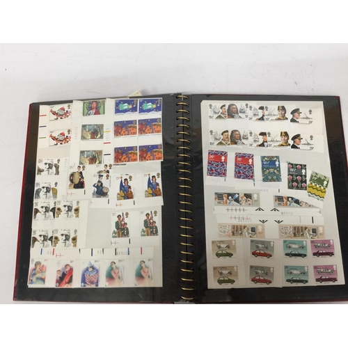 377 - A STAMP ALBUM CONTAINING A LARGE QUANTITY OF BRITISH MINT STAMPS