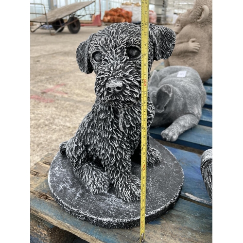 244 - A CONCRETE GARDEN ORNAMENT IN A FORM OF A PUPPY DOG 26CM TALL NO VAT