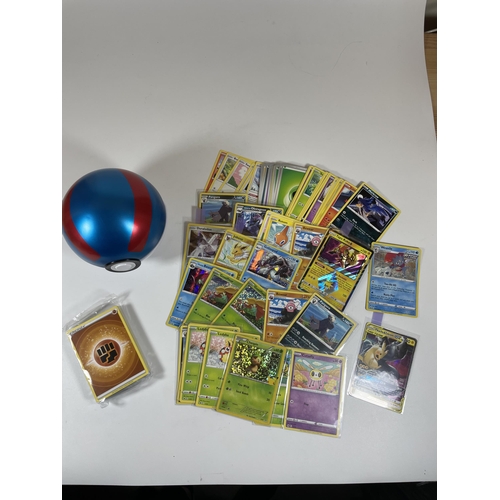 103 - A POKE BALL TIN OF POKEMON TRADING CARDS, HOLOS, PIKACHU GX, SEALED ENERGY PACK ETC