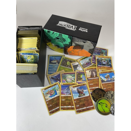 108 - A TRAINER BOX OF ASSORTED POKEMON TRADING CARDS, HOLOS, TOKENS ETC