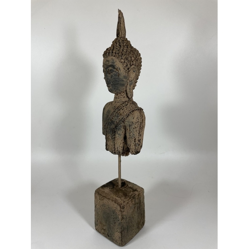 109 - A DECORATIVE STONE BUDDHA ON PLINTH, HEIGHT 39CM