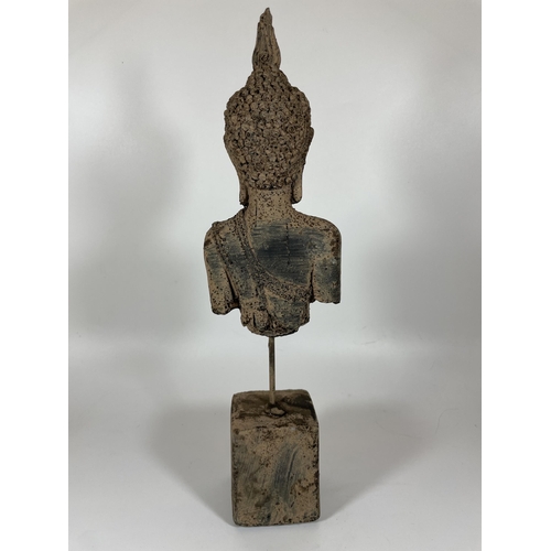 109 - A DECORATIVE STONE BUDDHA ON PLINTH, HEIGHT 39CM