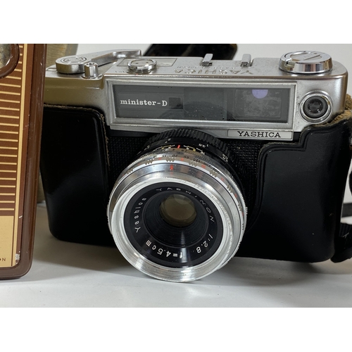 124 - THREE VINTAGE CAMERAS - CASED KODAK BROWNIE FLASH IV, YASHICA MINISTER-D FITTED WITH 45MM LENS AND A... 