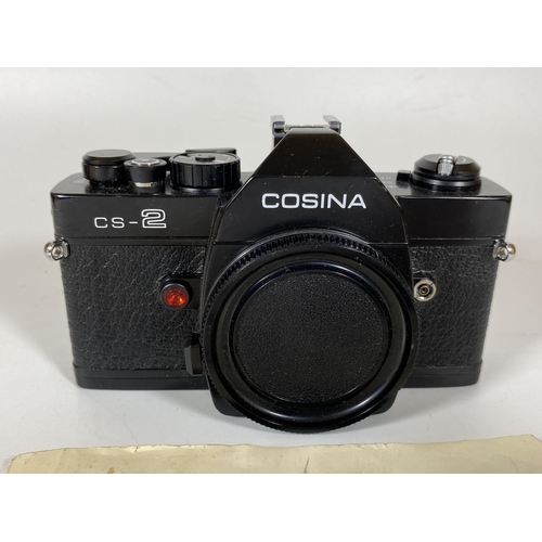 132 - A VINTAGE COSINA CS-2 CAMERA BODY WITH ORIGINAL INSTRUCTION BOOKLET