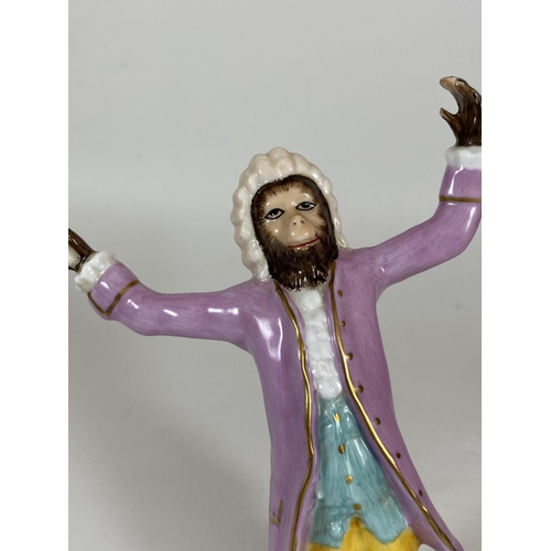 701 - A CONTINENTAL DRESDEN STYLE PORCELAIN MONKEY CONDUCTOR MUSICIAN FIGURE, HEIGHT 17CM