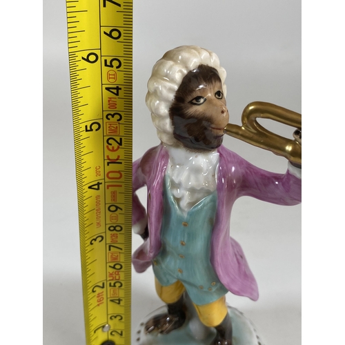 702 - A CONTINENTAL DRESDEN STYLE PORCELAIN MONKEY TRUMPET PLAYER MUSICIAN FIGURE, HEIGHT 15.5CM