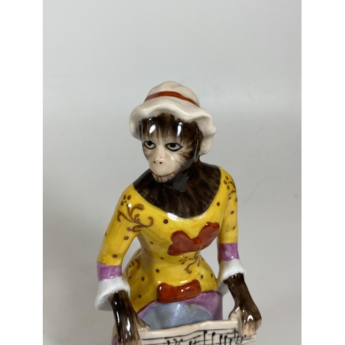 706 - A CONTINENTAL DRESDEN STYLE PORCELAIN MONKEY SHEET MUSIC MUSICIAN FIGURE, HEIGHT 16CM