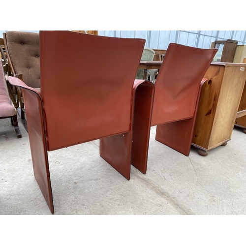 2802 - A PAIR OF BROWN FAUX LEATHER ARM CHAIRS ON METALWARE FRAME WITH OVERCAPPING ARMS