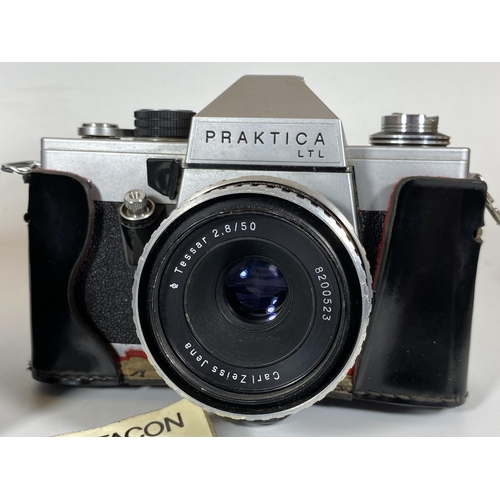 136 - A VINTAGE CASED PRAKTICA LTL CAMERA FITTED WITH CARL ZEISS JENA 2.8/50M LENS AND ORIGINAL BOOKLET