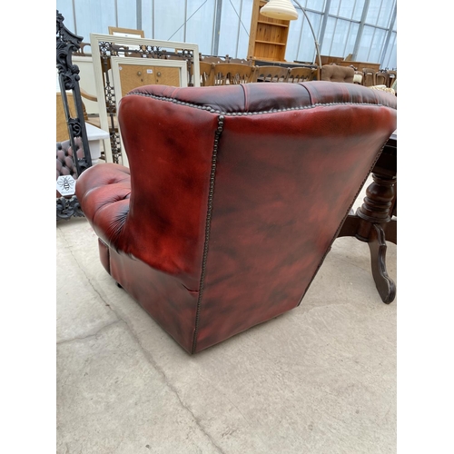 2805 - AN OXBLOOD LEATHER CHESTERFIELD EASY CHAIR