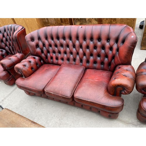 2806 - AN OXBLOOD LEATHER CHESTERFIELD EASY CHAIR