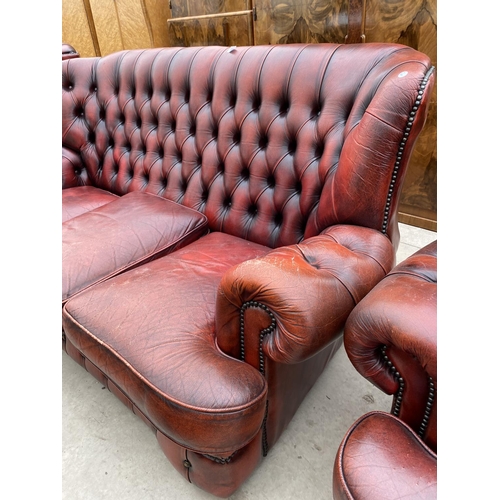 2806 - AN OXBLOOD LEATHER CHESTERFIELD EASY CHAIR