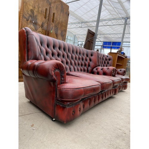 2806 - AN OXBLOOD LEATHER CHESTERFIELD EASY CHAIR