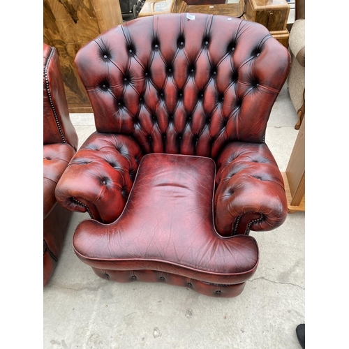 2807 - AN OXBLOOD LEATHER CHESTERFIELD EASY CHAIR