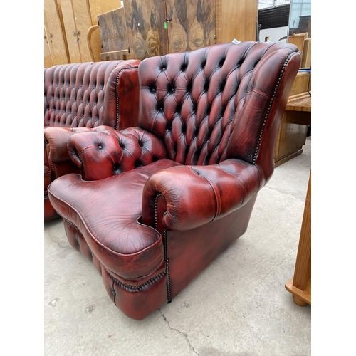 2807 - AN OXBLOOD LEATHER CHESTERFIELD EASY CHAIR