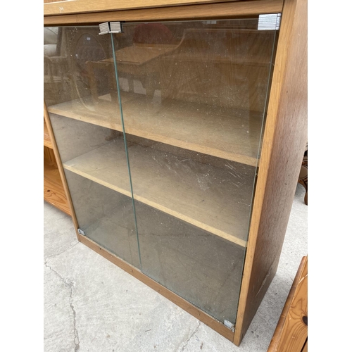 2809 - A MODERN OAK TWO DOOR GLAZED BOOKCASE, 31.5