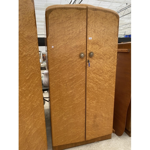 2815 - A 'DURABLE SUITES' MID 20TH CENTURY MAPLE BEDROOM SUITE COMPRISING OF TWO WARDROBES, DRESSING TABLE ... 