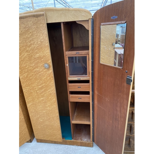 2815 - A 'DURABLE SUITES' MID 20TH CENTURY MAPLE BEDROOM SUITE COMPRISING OF TWO WARDROBES, DRESSING TABLE ... 