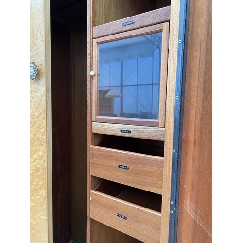 2815 - A 'DURABLE SUITES' MID 20TH CENTURY MAPLE BEDROOM SUITE COMPRISING OF TWO WARDROBES, DRESSING TABLE ... 