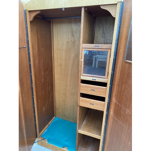 2815 - A 'DURABLE SUITES' MID 20TH CENTURY MAPLE BEDROOM SUITE COMPRISING OF TWO WARDROBES, DRESSING TABLE ... 