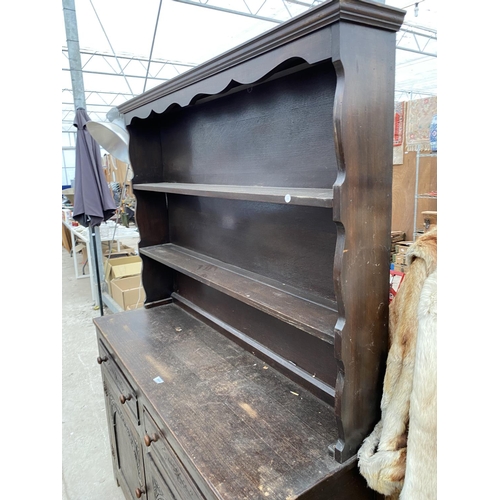 2824 - A MID 20TH CENTURY OAK DRESSER COMPLETE WITH RACK, 54