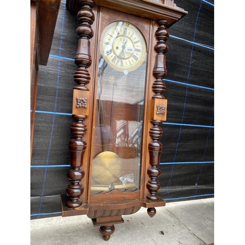 2849 - A VICTORIAN WALNUT 8 DAY WALL CLOCK WITH ROMAN NUMERALS AND TWO WEIGHTS