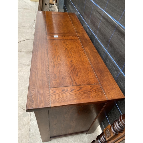 2849A - A MODERN OAK SIDEBOARD ENCLOSING SIX DRAWERS AND TWO CUPBOARDS, 59