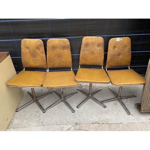 2850A - A SET OF FOUR REVOLVING CHAIRS ON POLISHED CHROME BASES