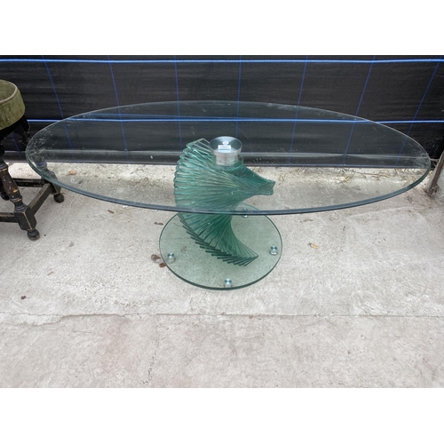 2861 - A MODERN SWIRL GLASS OVAL COFFEE TABLE, 47