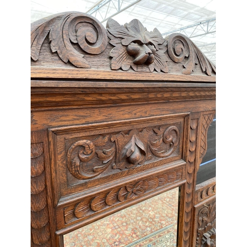 2863 - A VICTORIAN CARVED OAK MIRRORED HALL STAND