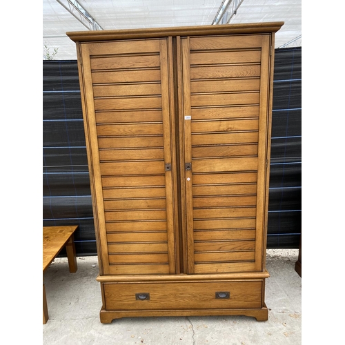 2865 - AN OAK 'ARIGHI BIANCHI' DOUBLE WARDROBE WITH DRAWER TO BASE, 49