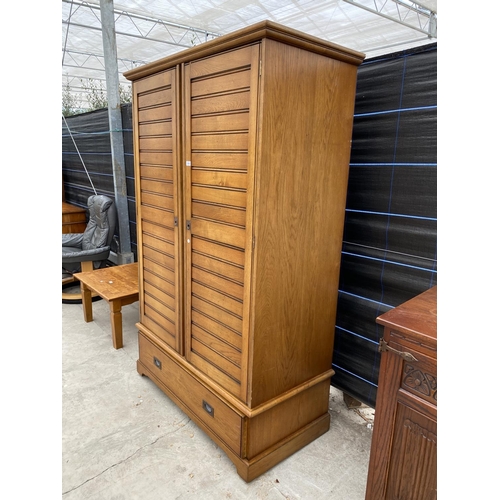 2865 - AN OAK 'ARIGHI BIANCHI' DOUBLE WARDROBE WITH DRAWER TO BASE, 49